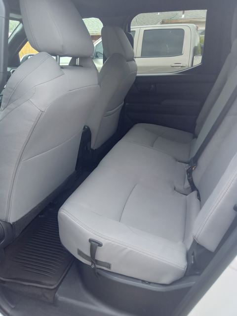 Light gray rear bench seat in a pickup cab