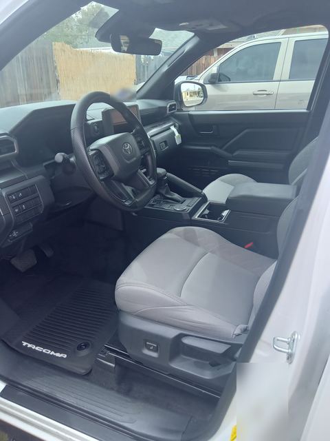 Toyota Tacoma front interior with gray seats and steering wheel